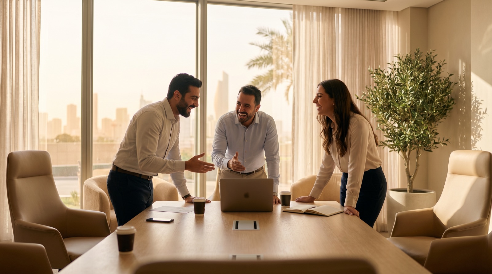 A marketing agency meeting with a client in a modern Kuwait office