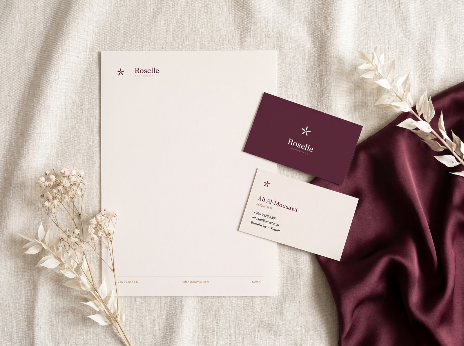 Roselle stationery — letterhead and plum business cards on cream silk